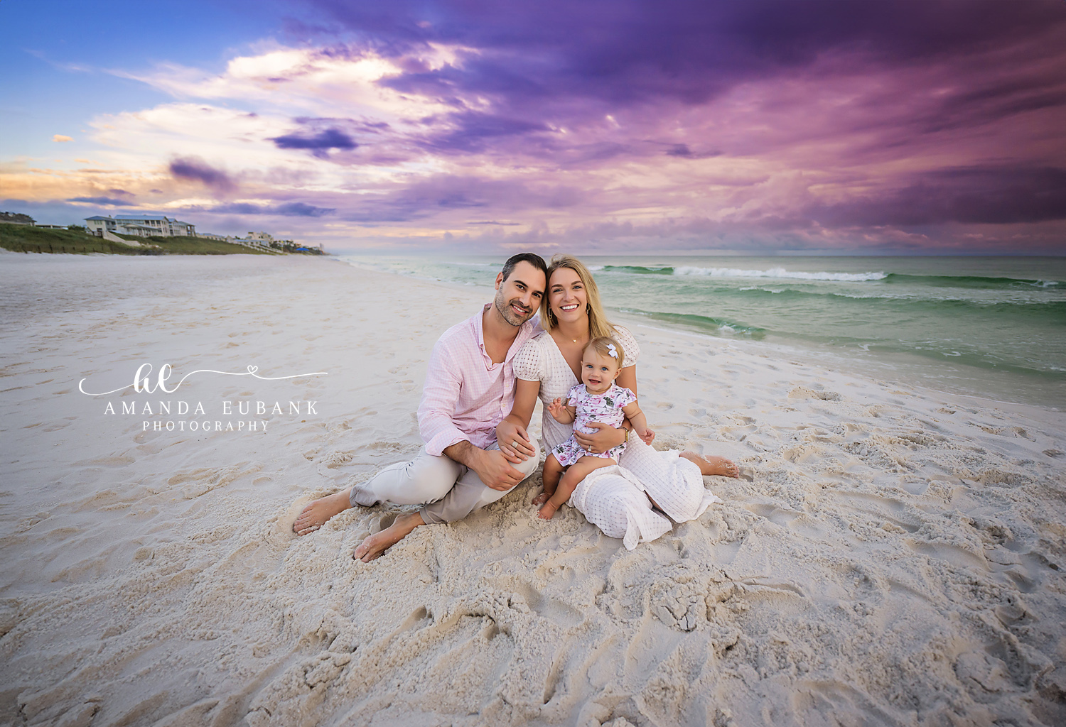 Family posing together on the beach at sunset in Seaside Florida