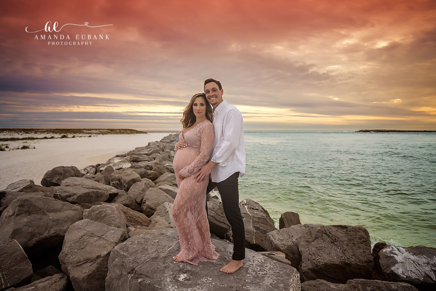 Seaside FL maternity photographer captures expecting mother in an elegant outdoor garden portrait session