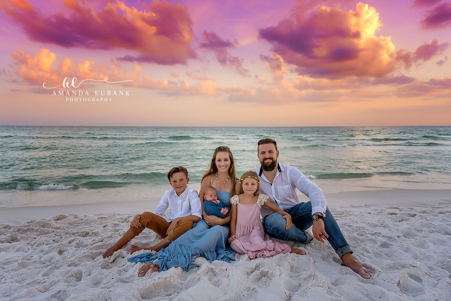Seaside Florida Newborn Photographer | Beach Newborn Portrait Sleeping newborn baby on white sand beach photographed during a golden-hour Seaside Florida newborn session