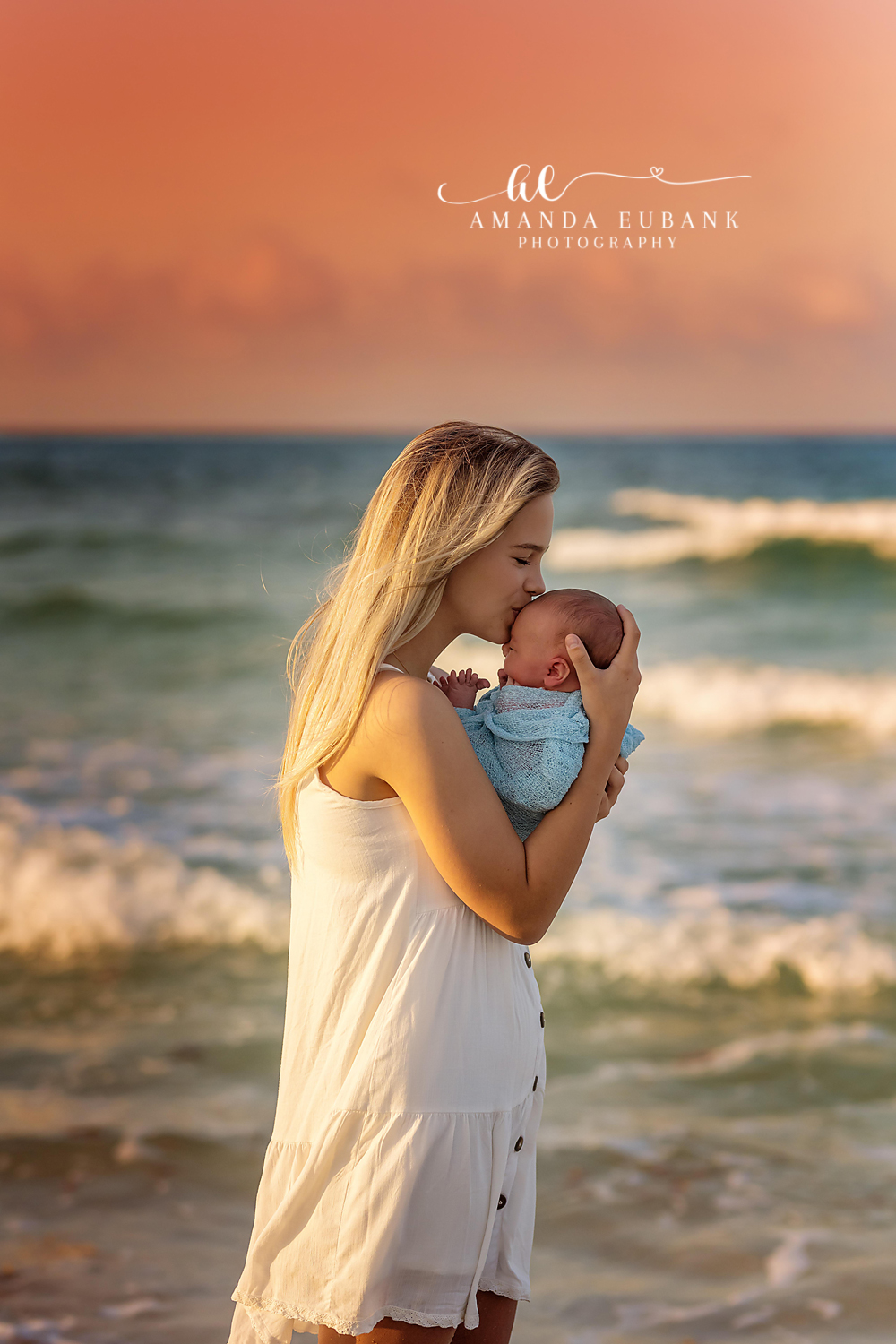 Seaside FL Newborn Photographer | Emerald Coast Newborn Session Amanda Eubank Photography captures a newborn portrait at golden hour on Seaside Florida's Emerald Coast