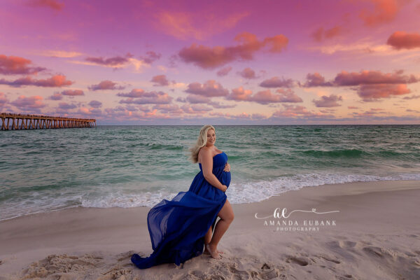 Natural light maternity photography on the Seaside Florida coastline at golden hour