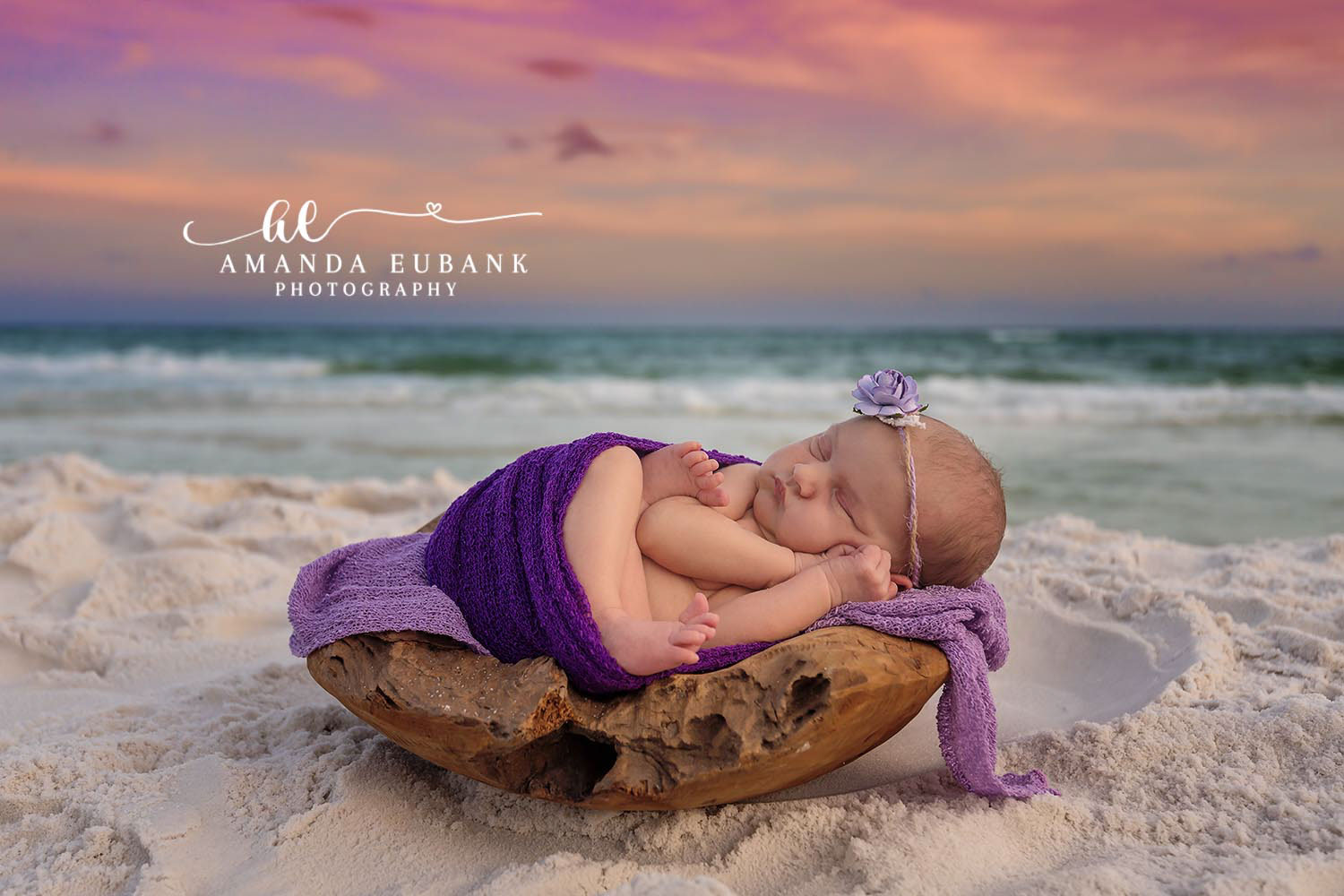 Baby girl with lace headband peacefully sleeping on the beach during a Seaside Florida newborn session